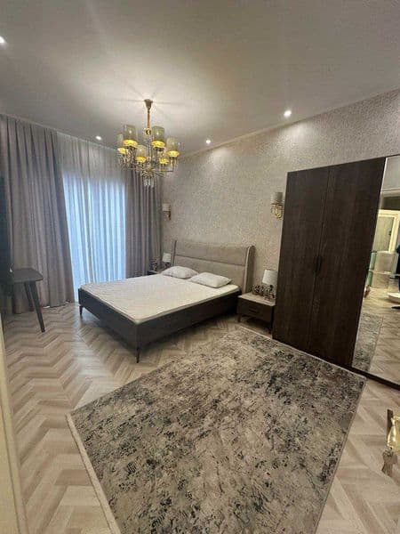 2 комнаты • 56 м² • 5/9 этаж<br />
<br />
Район: Мирзо Улугб — фото 2