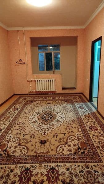 Chilonzor 18da parlament binosi qarama qarshisida kvartira b