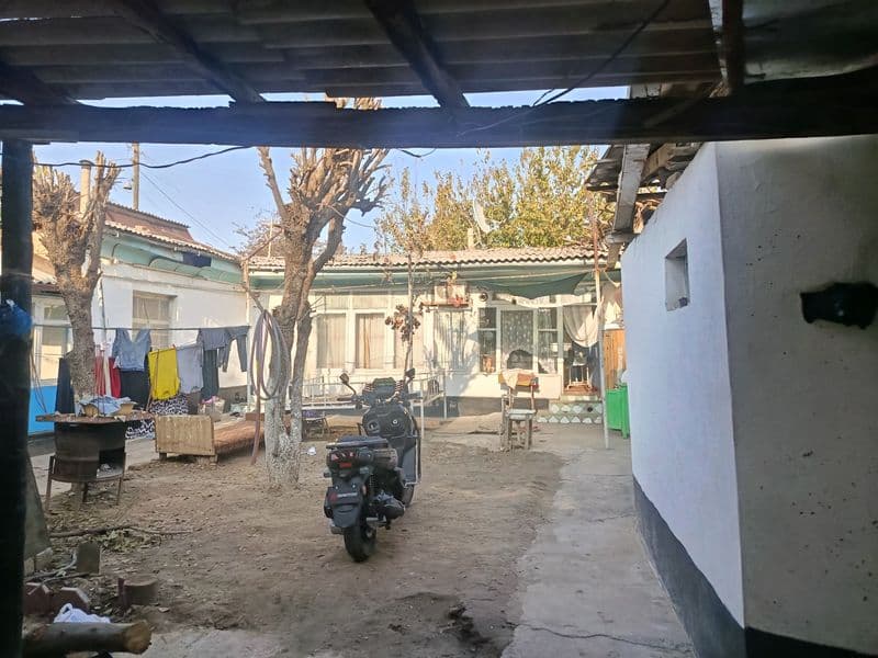 Участок находится в Мирзо Улугбек районе Олтинтепа махалле О — фото 2