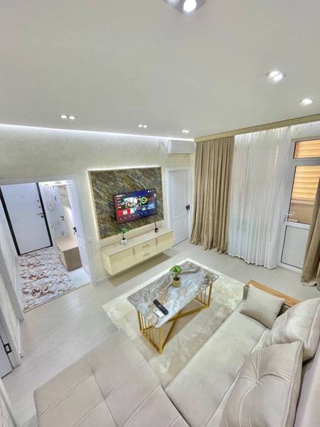 Mirzo ulug’bek metro oldidagi dom. Karzinka orqasidagi dom. 