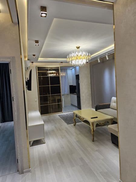 Новостройка Паркент 1й.этаж 2 ком.65м2 ц.800$ собственник — фото 4